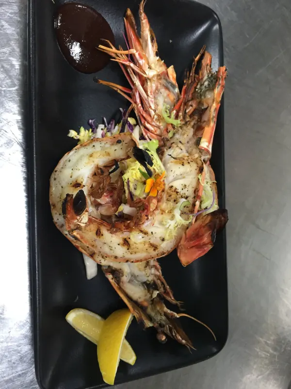 Grilled prawns plated by Chef Kimberly